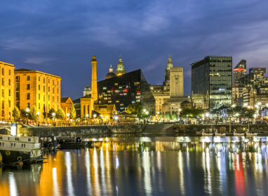 Liverpool, UK - August 17, 2016: Panoramic view across the Albert Dock in Liverpool. Boats can be seen moored in the dock.  There are no people in the photograph.